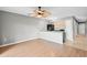 Open layout showcasing the kitchen and living area, complete with modern appliances and neutral tones at 4101 Pinehurst Circle # Aa-3, Little River, SC 29566