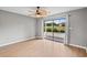 Living room with sliding glass doors to the balcony and natural light at 4101 Pinehurst Circle # Aa-3, Little River, SC 29566