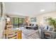 Comfortable living room featuring stylish furnishings and a sliding door to the outdoor area at 415 Ocean Creek Dr. # 2372, Myrtle Beach, SC 29572