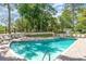 Inviting community pool area with lounge chairs, clear water, and well-maintained surroundings at 415 Ocean Creek Dr. # 2372, Myrtle Beach, SC 29572