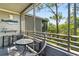 Charming screened porch with seating, ideal for relaxing at 415 Ocean Creek Dr. # 2372, Myrtle Beach, SC 29572