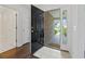 Inviting foyer showcasing a glimpse of the home's bright interior and beautiful flooring at 4196 Ravenwood Dr., Little River, SC 29566