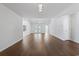 Bright and spacious living room featuring hardwood floors, vaulted ceilings, and an open layout at 4196 Ravenwood Dr., Little River, SC 29566