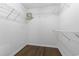 Walk-in closet featuring built-in shelving at 4196 Ravenwood Dr., Little River, SC 29566