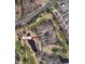 Aerial view shows the home's location within a golf course community at 4333 Oakwood Circle, Little River, SC 29566