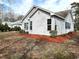 Charming one-story home boasts vinyl siding and well-maintained landscaping at 4333 Oakwood Circle, Little River, SC 29566