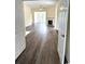 Bright, open living space featuring hardwood floors and a fireplace at 4333 Oakwood Circle, Little River, SC 29566