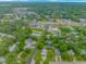 An aerial view of a wooded neighborhood with a mix of commercial and residential properties at 4600 Murrells Inlet Rd., Murrells Inlet, SC 29576