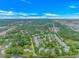 Aerial view of a residential neighborhood featuring homes with tree coverage at 4600 Murrells Inlet Rd., Murrells Inlet, SC 29576