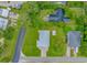 An aerial view of a neighborhood featuring a home with a green grass lawn at 4600 Murrells Inlet Rd., Murrells Inlet, SC 29576