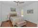 Comfortable bedroom featuring a queen bed, hardwood floors, and stylish décor at 4600 Murrells Inlet Rd., Murrells Inlet, SC 29576