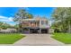 Charming coastal home with a covered porch, spacious driveway, and well-maintained lawn at 4600 Murrells Inlet Rd., Murrells Inlet, SC 29576
