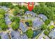 Overhead view highlighting the location of the community condos, mature trees, and a shared pond at 4840 Moss Creek Loop # 38, Murrells Inlet, SC 29576