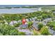 Aerial view of a community surrounded by trees and water at 4840 Moss Creek Loop # 38, Murrells Inlet, SC 29576