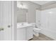 This bathroom includes a sink and cabinet, toilet, shower and tub combination at 4840 Moss Creek Loop # 38, Murrells Inlet, SC 29576