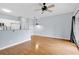 An open floor plan highlights this living room with hardwood floors and updated, eat-in kitchen at 4840 Moss Creek Loop # 38, Murrells Inlet, SC 29576