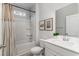 Bathroom with tub and shower combo, plus bright vanity and framed art at 501 Haven View Way, Murrells Inlet, SC 29576