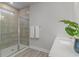 Bright bathroom with a tiled shower and vanity with sink at 501 Haven View Way, Murrells Inlet, SC 29576