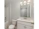 Bathroom with tub and shower combo, plus bright vanity and medicine cabinet at 501 Haven View Way, Murrells Inlet, SC 29576