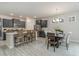 Well-lit open concept kitchen and dining area with stainless steel appliances at 501 Haven View Way, Murrells Inlet, SC 29576