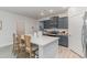Spacious kitchen with granite countertops, a central island and eat-in bar seating at 501 Haven View Way, Murrells Inlet, SC 29576
