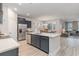 Open kitchen featuring a central island, stainless steel appliances, and views to living spaces at 501 Haven View Way, Murrells Inlet, SC 29576