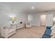 Open-concept living room featuring neutral colors, ample seating, and bright lighting at 501 Haven View Way, Murrells Inlet, SC 29576