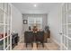 Bright home office with a large window and a wooden desk perfect for working at home at 501 Haven View Way, Murrells Inlet, SC 29576