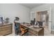Comfortable home office with lots of desk space and view of the staircase and hallway at 501 Haven View Way, Murrells Inlet, SC 29576