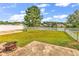 A spacious backyard featuring a well manicured lawn and a white picket fence surrounding the property at 5031 Medieval Dr., Conway, SC 29526