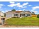 Beautiful single-story home with an attached garage, landscaped front yard, and cozy porch at 5031 Medieval Dr., Conway, SC 29526