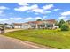 Charming single-story home with a well-manicured lawn and attached garage at 5031 Medieval Dr., Conway, SC 29526