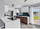 Modern kitchen featuring stainless steel appliances, ample counter space, and backyard views at 5031 Medieval Dr., Conway, SC 29526