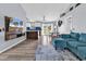 Bright and airy living room showcasing a modern kitchen, dining area, and comfortable seating at 5031 Medieval Dr., Conway, SC 29526