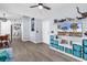 Spacious living room featuring modern wood flooring and stylish decor at 5031 Medieval Dr., Conway, SC 29526