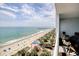 Stunning balcony view overlooking the beach, ocean, and boardwalk, enhancing the resort experience at 504 N Ocean Blvd. # 1106, Myrtle Beach, SC 29577