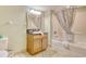 Standard bathroom with a shower-tub combo, vanity with storage, and neutral tile at 504 N Ocean Blvd. # 1106, Myrtle Beach, SC 29577