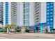Bay View Resort featuring a modern exterior with balconies and blue accents at 504 N Ocean Blvd. # 1106, Myrtle Beach, SC 29577