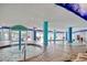 Inviting indoor pool and splash pad area with colorful columns at 504 N Ocean Blvd. # 1106, Myrtle Beach, SC 29577