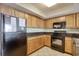 Kitchen featuring stainless appliances and light wood cabinets for storage at 504 N Ocean Blvd. # 1106, Myrtle Beach, SC 29577