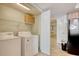 Well-equipped laundry room with appliances and storage space at 504 N Ocean Blvd. # 1106, Myrtle Beach, SC 29577