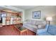 Comfortable living room featuring a kitchen bar and cozy seating area at 504 N Ocean Blvd. # 1106, Myrtle Beach, SC 29577