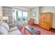 Cozy living room with a sofa, sitting chairs, and an ocean view balcony at 504 N Ocean Blvd. # 1106, Myrtle Beach, SC 29577