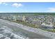 Aerial view showcasing the property near the beach and ocean at 5409 N Ocean Blvd. # 100, North Myrtle Beach, SC 29582