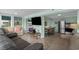 Wide view of the living room showing tiled floors, kitchen and dining area in background at 5409 N Ocean Blvd. # 100, North Myrtle Beach, SC 29582