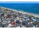 An aerial view of beach homes close to the ocean, with a red marker on the house location at 6001 - 1082 S Kings Hwy., Myrtle Beach, SC 29575