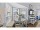 Bright breakfast nook with bench seating, round table and large windows allowing ample natural light at 6001 - 1082 S Kings Hwy., Myrtle Beach, SC 29575