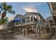 Charming elevated beach home with covered parking and a spacious balcony, perfect for coastal living at 6001 - 1082 S Kings Hwy., Myrtle Beach, SC 29575