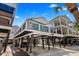Coastal home elevated on pilings with spacious deck and convenient parking below at 6001 - 1082 S Kings Hwy., Myrtle Beach, SC 29575