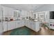 Bright kitchen with white cabinets, stainless steel appliances, and ample counter space at 6001 - 1082 S Kings Hwy., Myrtle Beach, SC 29575